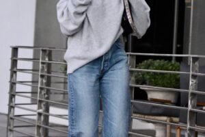 Instead of T-Shirts and Tanks, This Jumper Trend Makes Stove-Pipe Jeans Look Chicest
